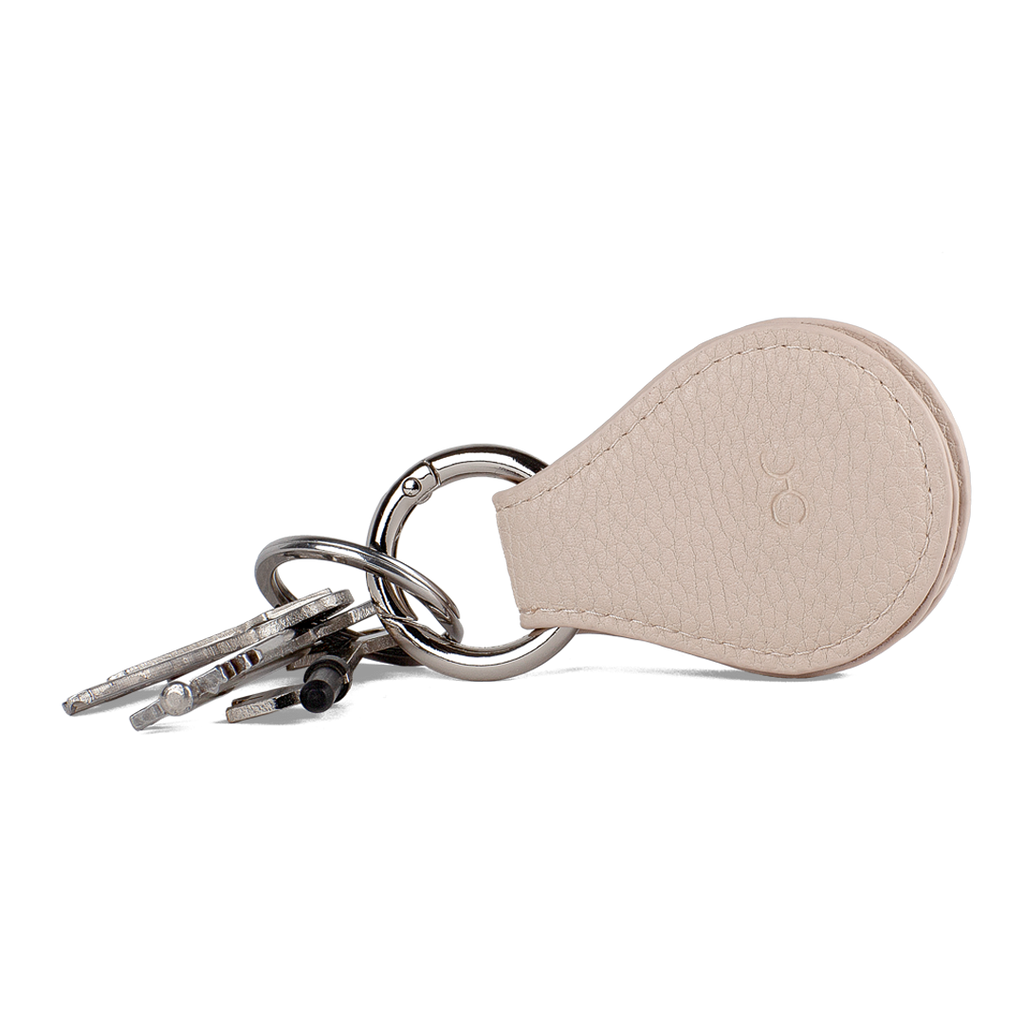 two beige magnetic lens protectors for your sunglasses or glasses stored on a keyring