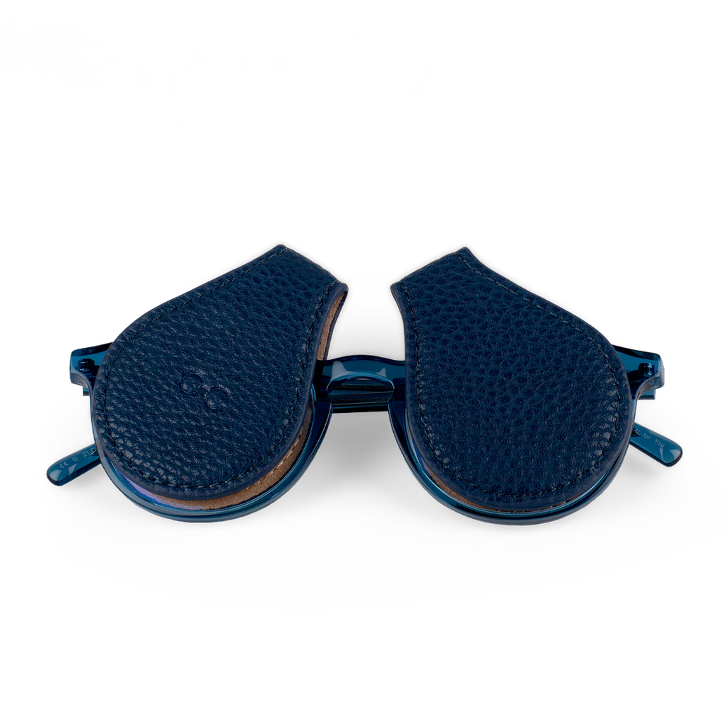 two blue lens protectors for your sunglasses that clip on to the lens
