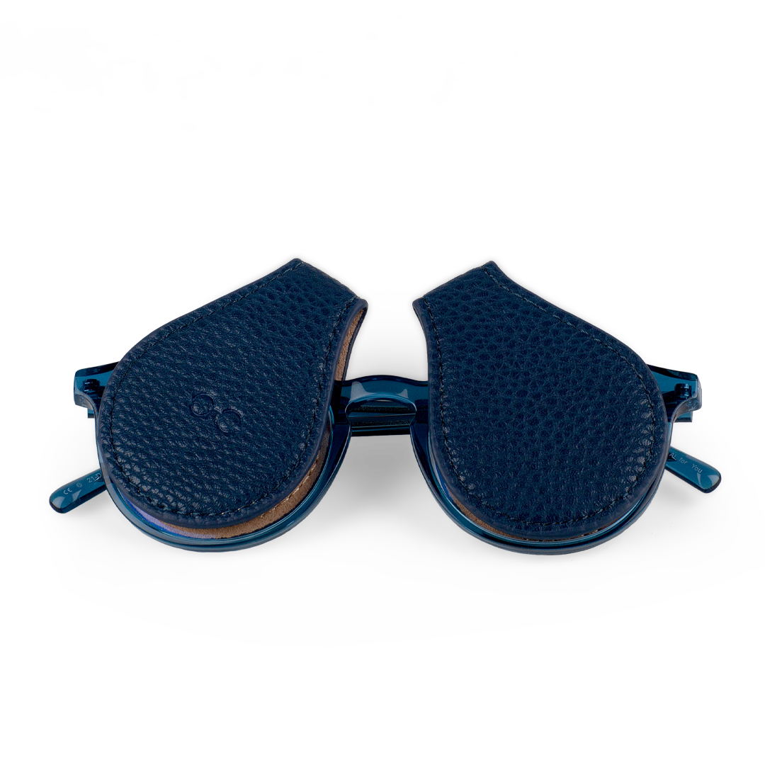 two blue lens protectors for your sunglasses that clip on to the lens