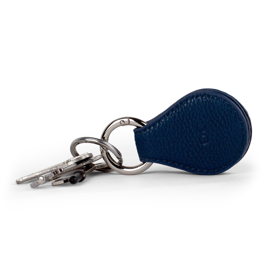 two blue magnetic lens protectors for your sunglasses or glasses stored on a keyring