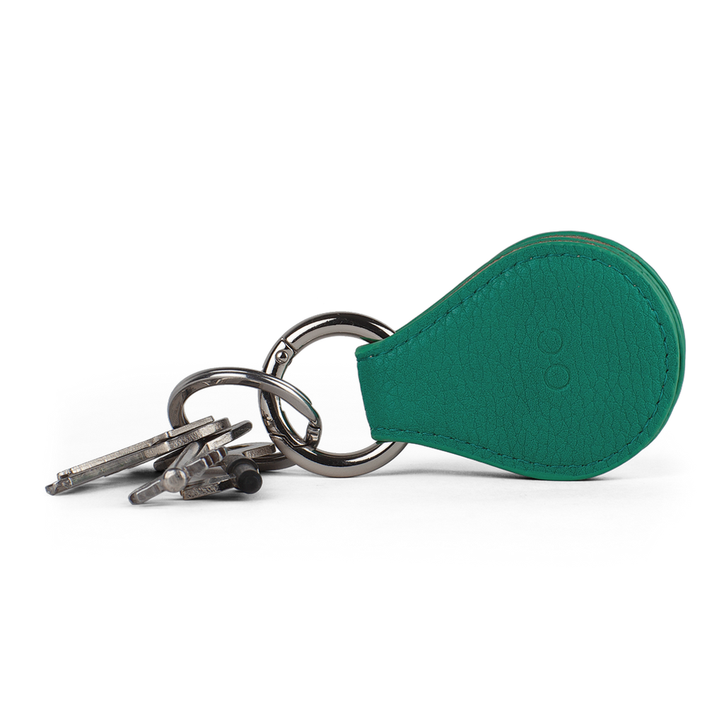 A pair of green lens protectors for your sunglasses stored on a keyring