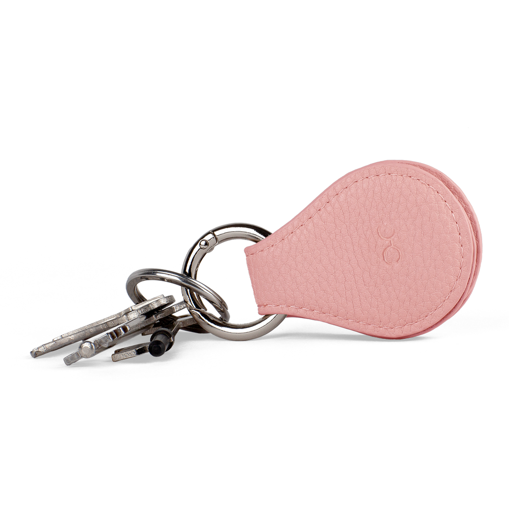two pink magnetic lens protectors for your sunglasses or glasses stored on a keyring